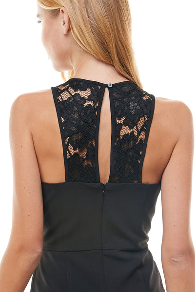 Monique Black Mini Dress. High neckline and Racer back lace detail. Hidden back zipper closure Mini ruffle hem line.