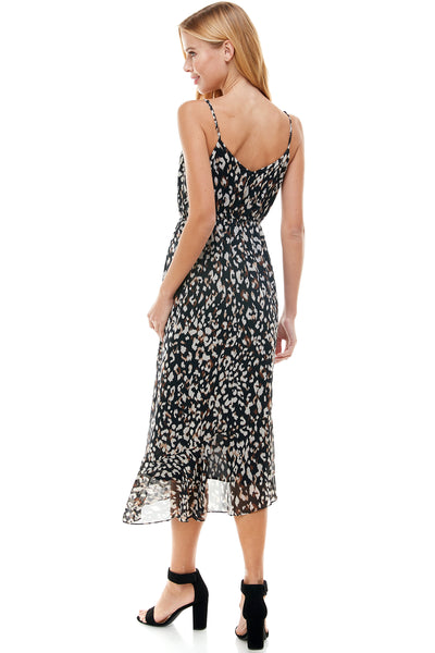 Eliza High low Dress in Black animal print. Adjustable spaghetti strap and waist drawstring. Cascading front detail.