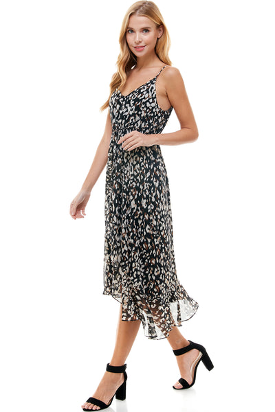 Eliza High low Dress in Black animal print. Adjustable spaghetti strap and waist drawstring. Cascading front detail.