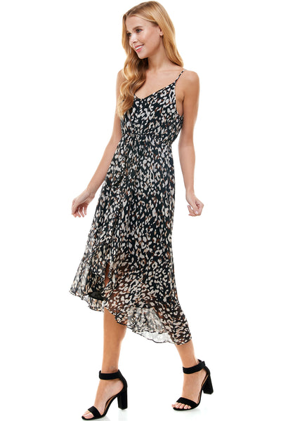 Eliza High low Dress in Black animal print. Adjustable spaghetti strap and waist drawstring. Cascading front detail.