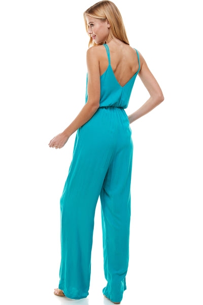 Nicolette Teal Jumpsuit. Spaghetti double strap with pockets. Elastic waistline.