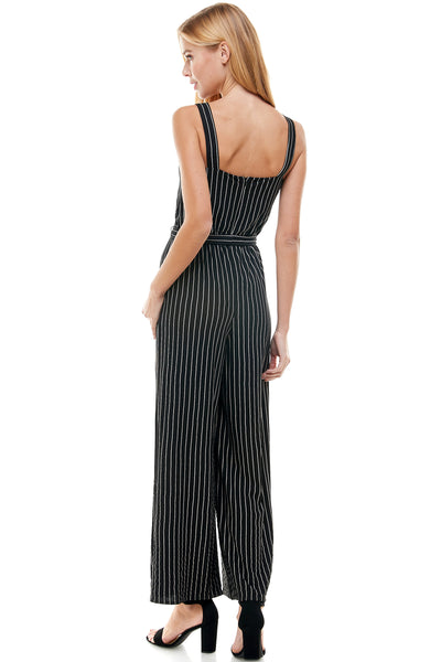 Abigail Jumpsuit in Navy pinstripe with Self Belt. Bust and center lace trim detail. Back hidden zipper closure.