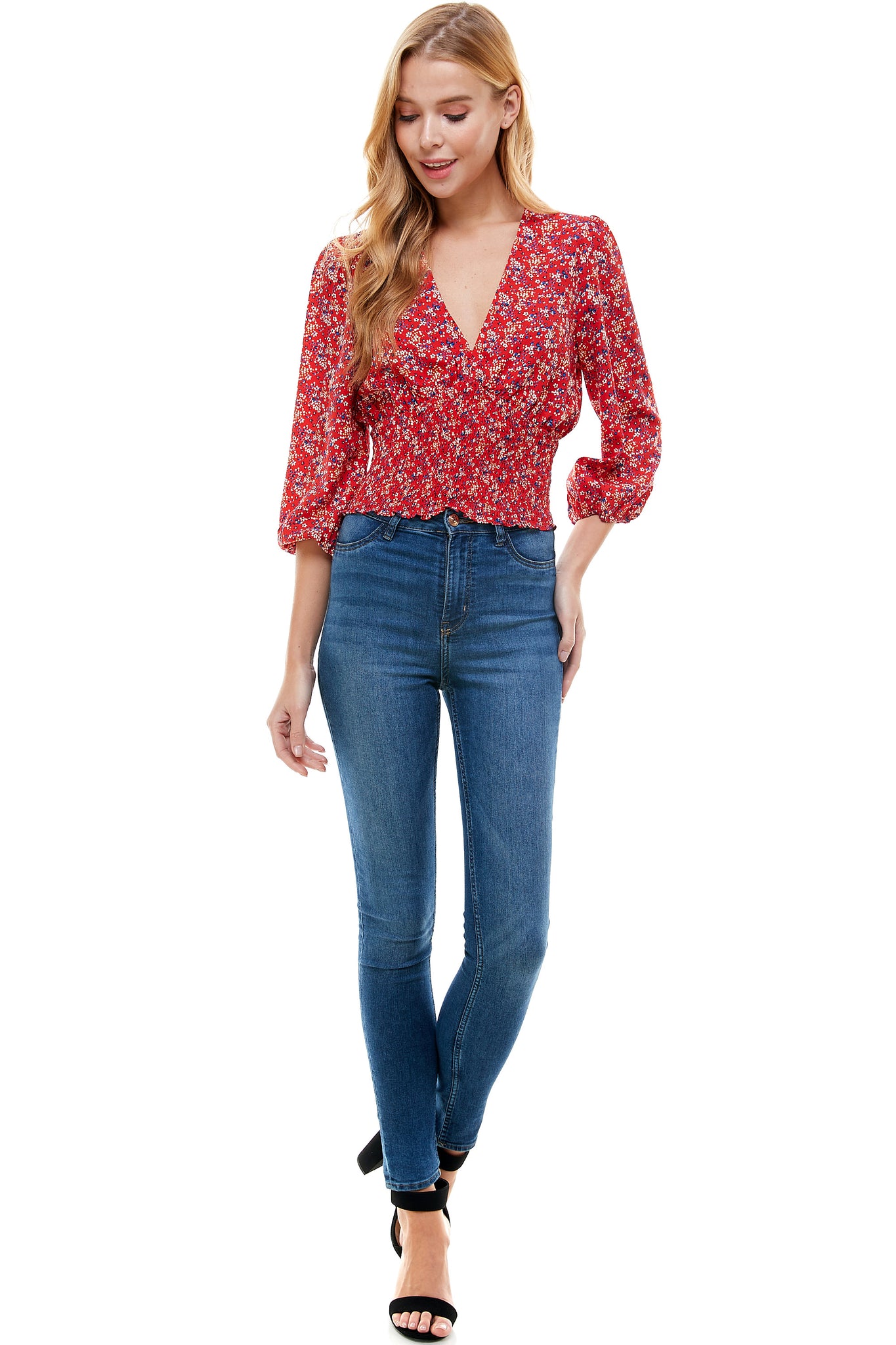 Veronica Long sleeve blouse in Red floral print. Plunging neck line with smocking at waist.